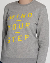 Load image into Gallery viewer, THE NEW COLLECTION. &quot;Mind Your Step&quot;. Unisex Sweater. Crew Neck. Heather Grey.
