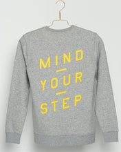 Load image into Gallery viewer, SPECIAL EDITION!  Full colour logo on the front! &quot;Mind Your Step&quot; on the back! Unisex Sweater, Crew Neck, Heather Grey.
